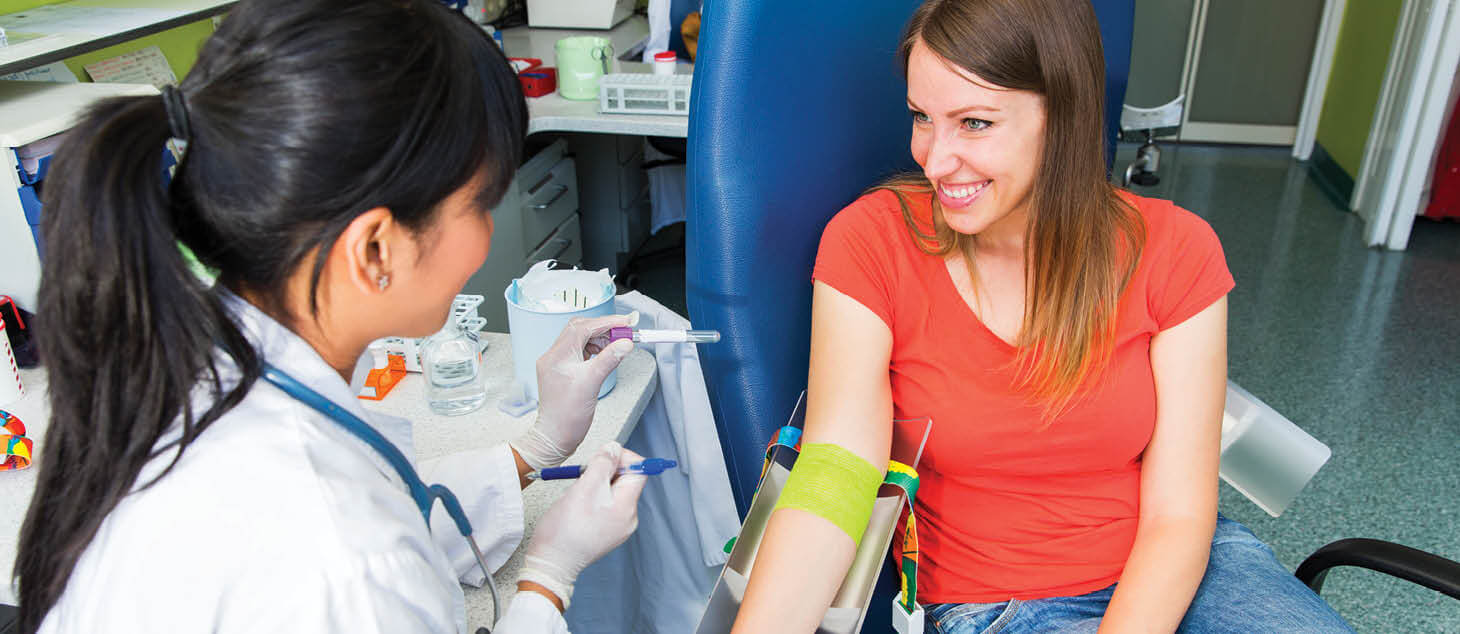 Woman giving blood